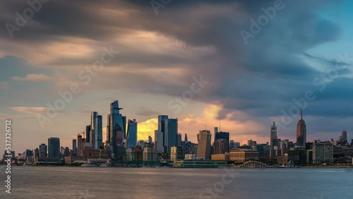Day to Night Timelapse Sunset Clouds Moving Over Hudson Yards Midtown Manhattan Skyline view from Hoboken New Jersey