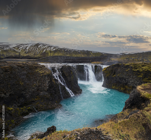 Picturesque waterfall Sigoldufoss autumn view. Season changing in southern Highlands of Iceland.