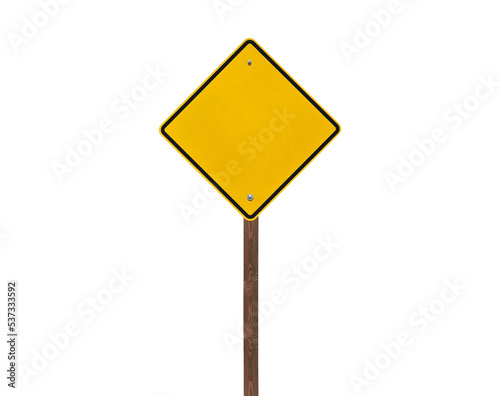 Blank yellow caution sign on a wooden post isolated.