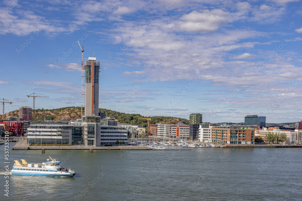 Obraz premium Gothenburg harbor with traffic and activity - cranes and ships/boats, Sweden,Scandinavia,Europe