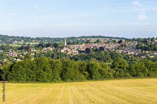 Early morning light on Midsummers Day (June 21st) on the Cotswold town of Painswick, Gloucestershire , England UK photo
