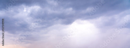 Dramatic sky background. Stormy clouds in dark sky. Moody cloudscape
