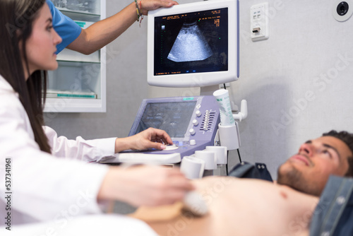 Man under ultrasound scan investigation