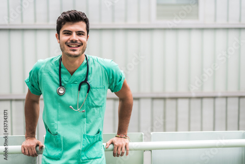 Doctor smiling posing in front of camera © DavidPrado