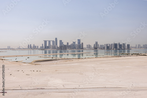 Abu-Dhabi skyline as seen from Saadiyat photo