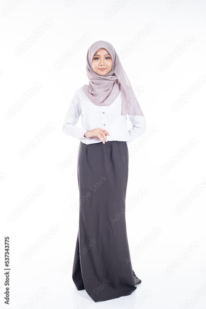 Portrait of Muslim woman in office attire and wearing a hijab. Asian woman in a corporate world. Formal corporate outfit and elegant appearance. Corporate or business people concept. Isolated