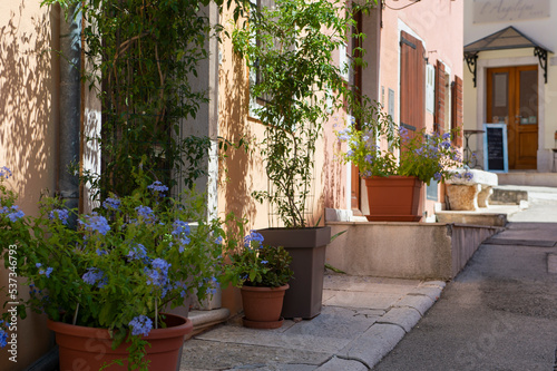 Fototapeta Naklejka Na Ścianę i Meble -  A little cobbles street in a Mediterranean country