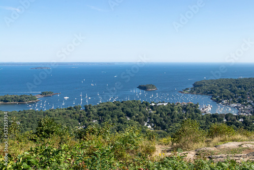 Harbor with land, sea and sky taken from an elevated position. 