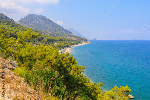 Very beautiful rocky Turkish Mediterranean coast in Beldibi district of Kemer, Antalya province in Turkey © Iurii Gagarin