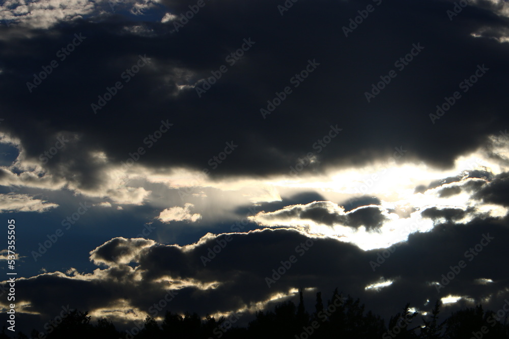 Large rain clouds in the sky over the sea. Large rain clouds in the sky over the sea.