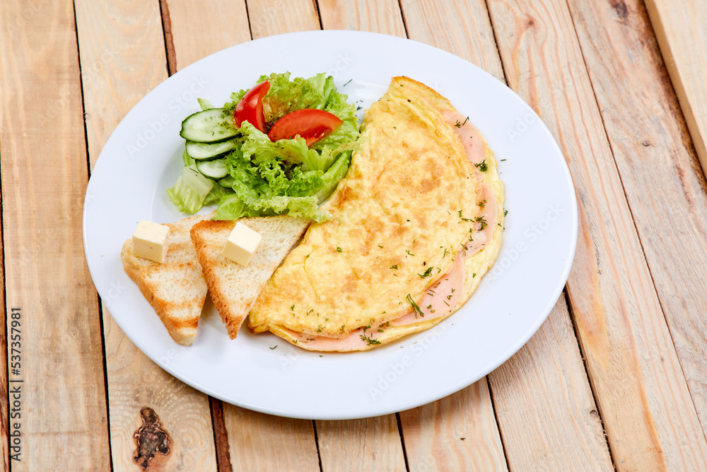 omelet with fresh vegetables and toasts omelet with fresh vegetables and toasts