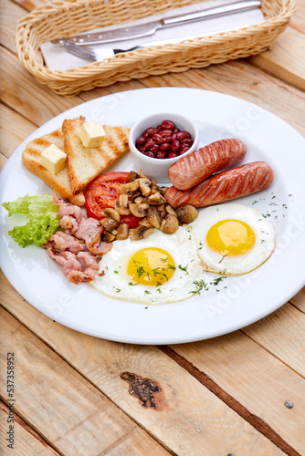 breakfast in the cafe on wooden background