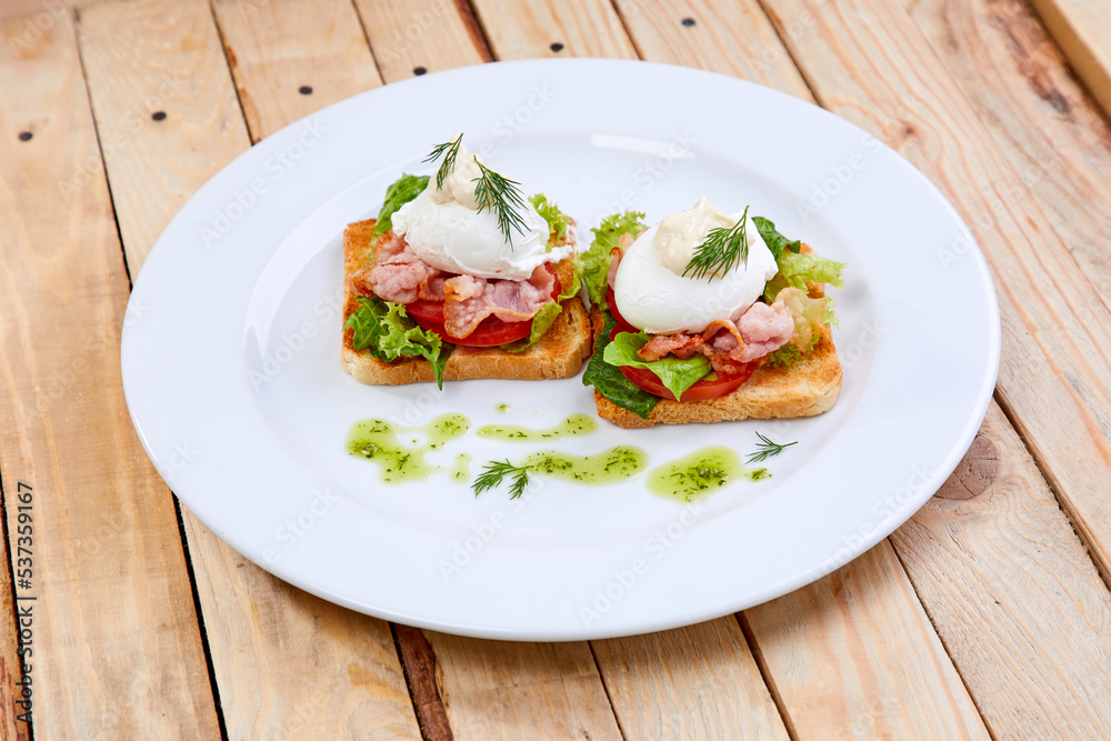 poached egg with bacon and herbs