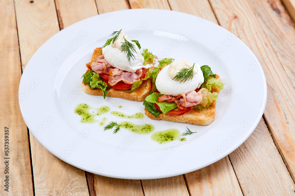 poached egg with bacon and herbs
