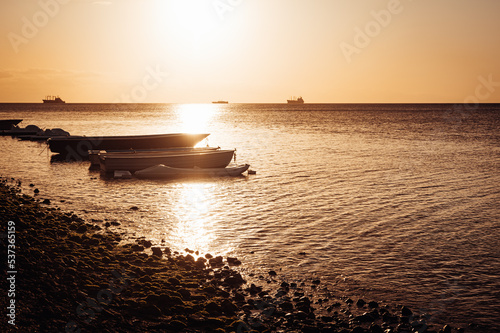 Sunset over fishing boats and commerical tankers, Tombeau Bay, Mauritius
