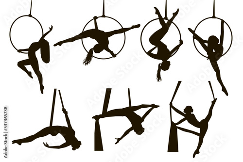 Silhouettes of a aerial gymnastic girl. Vector illustrations set on white background. Vector illustration