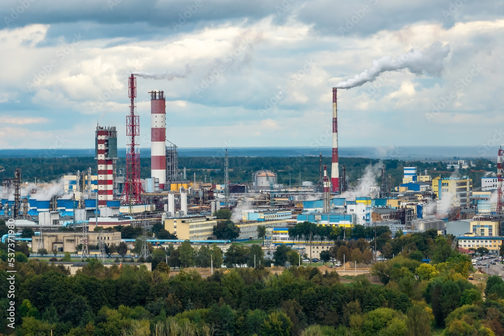 aerial panoramic view on smoke of pipes of chemical enterprise plant. Industrial landscape environmental pollution waste plant. Air pollution concept.