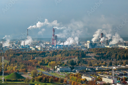 aerial panoramic view on smoke of pipes of chemical enterprise plant. Industrial landscape environmental pollution waste plant. Air pollution concept.
