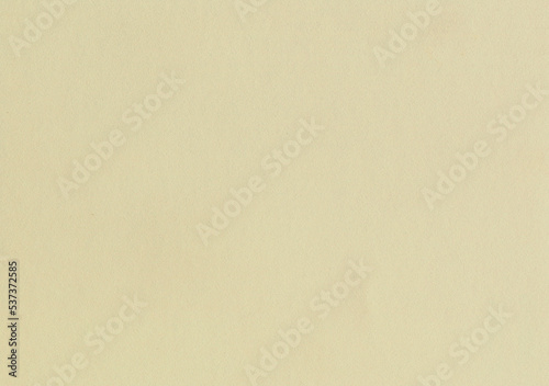 Highly detailed grainy, yellow, light brown, beige, cream, smooth paper texture background with sand like structure with copyspace for mockup or high resolution wallpaper
