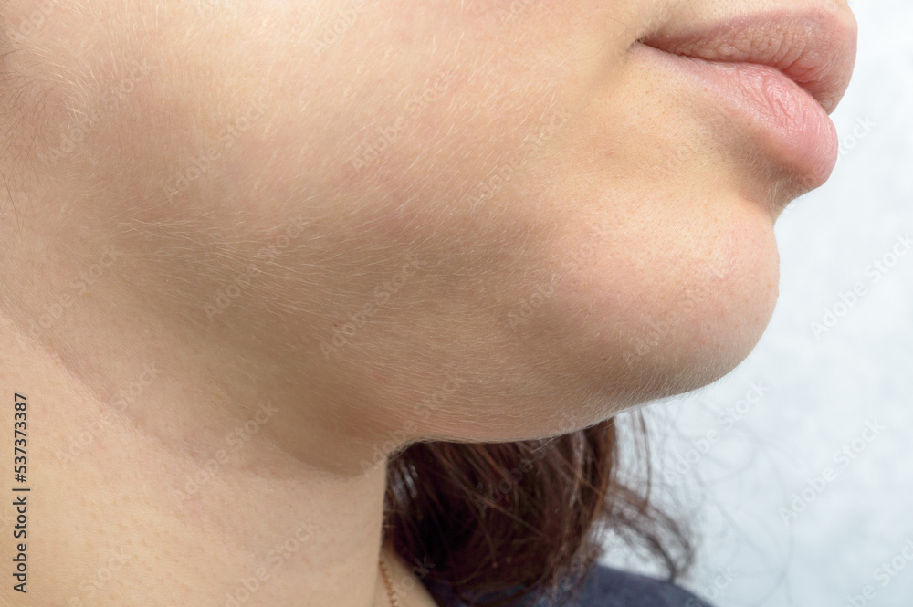 Obraz premium female chin on a white background