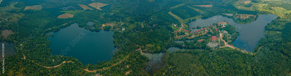 Panoramic aerial drone view of greenery scenery with a lake at Jasin, Melaka, Malaysia Panoramic aerial drone view of greenery scenery with a lake at Jasin, Melaka, Malaysia