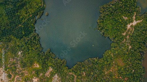 Aerial drone view of tropical scenery with dam lake at Jasin, Melaka, Malaysia