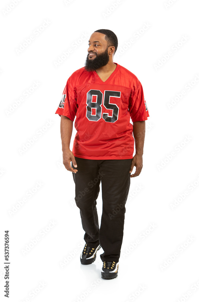 Obraz na plátně Fan: Man In Sports Jersey Walking And Gesturing