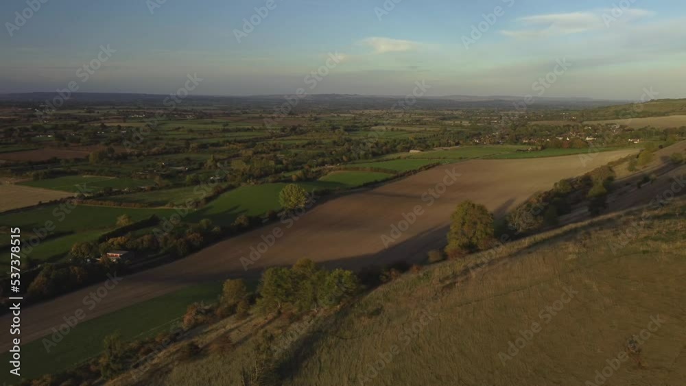 Transverse aerial past the Westbury White Horse. A hill figure. Evening light Transverse aerial past the Westbury White Horse. A hill figure. Evening light
