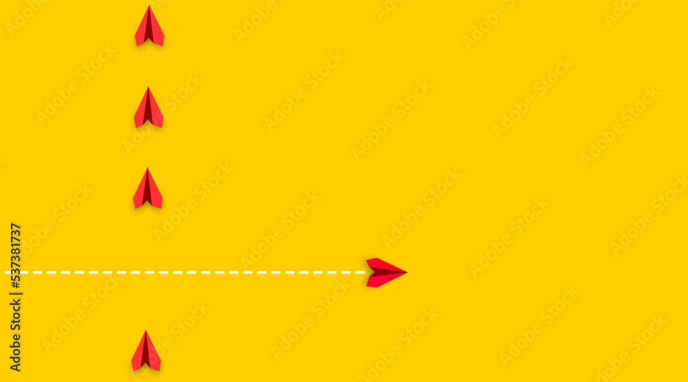 Paper airplanes. Red plane is flying in different direction from others ...