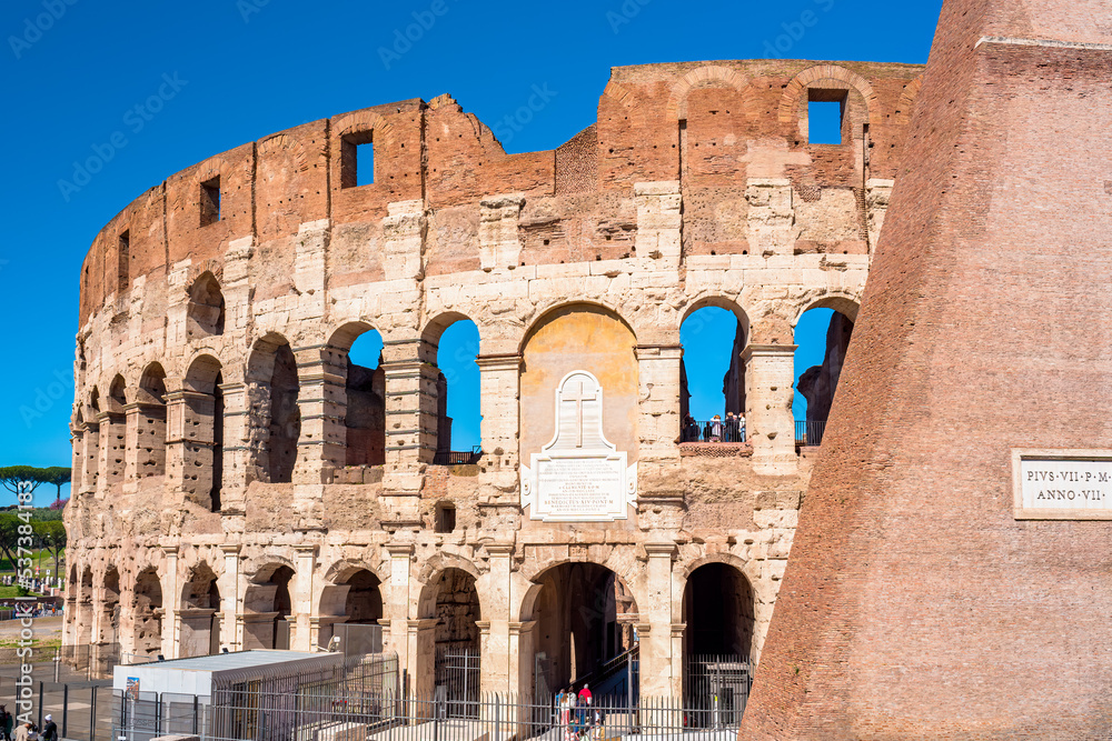 The Colosseum, Colosseo, iconic amphitheatre Arena in the centre of the old town of Rome, Roma, just east of the Roman Forum.