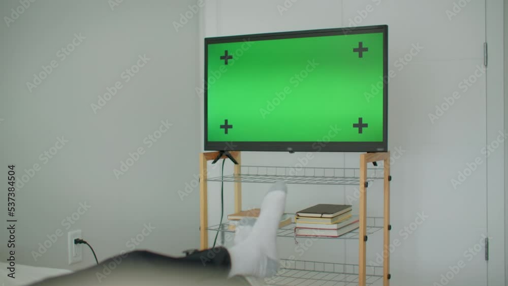 Tv in bedroom, green screen mockup Stock Video Adobe Stock