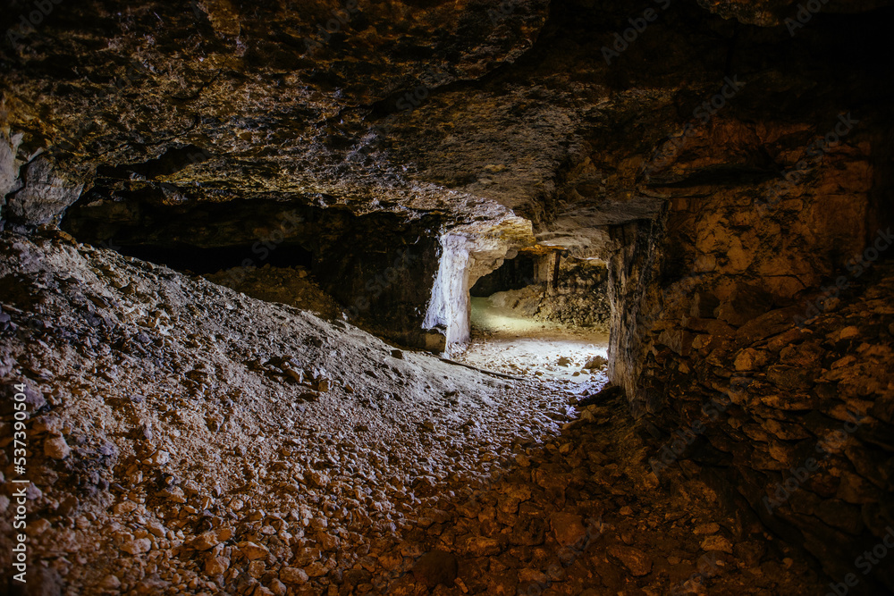 Obraz premium Old abandoned collapsed limestone mine