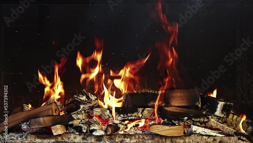 Pile Of Firewood Burning is a stock video that features amazing footage of woods burning in fireplace in slow motion.