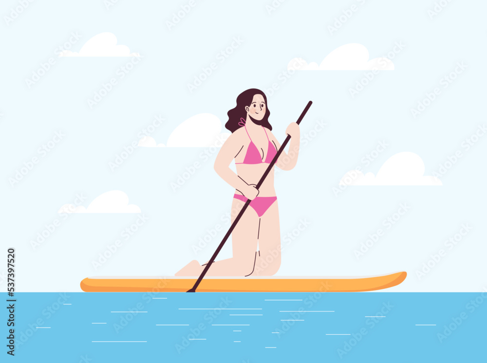 Young woman is on her knees in swimsuit on sup. Stand up paddle.