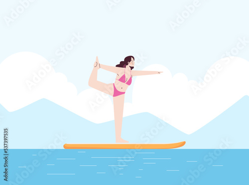 Young woman is doing yoga in swimsuit on sup. Stand up paddle.