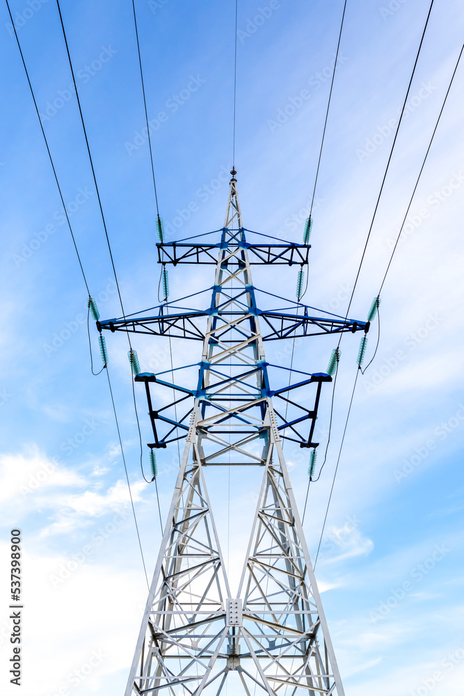 High voltage power lines. Transmission and supply of electricity concept. Vertical