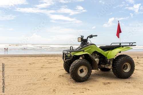 ATV motorcycle parked on the beach of Masachapa in Managua  Nicaragua