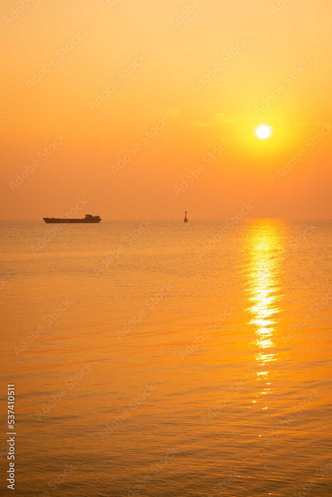 ship on the horizon at sunset ship on the horizon at sunset
