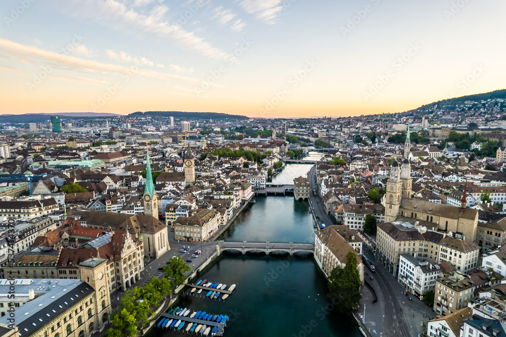 Aerial drone shot flying above Lake Zurich, Switzerland in sunny day. 