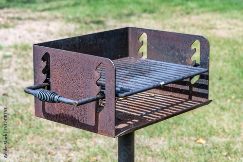 Bild auf Leinwand open metal grill at a public park area used for cooking food.