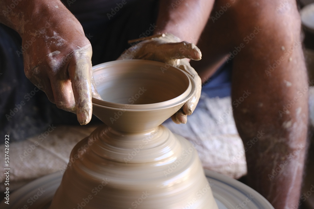 9 October 2022, Pune, India, Indian potter making Diya (oil lamps) or earthen lamps for Diwali Festival with clay, Handwork craft.