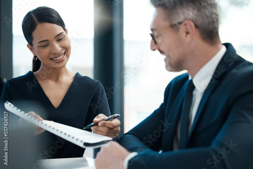 Legal, woman and lawyer in a meeting for a contract agreement for accountability in an office. Attorney, consulting and financial advisor giving finance paper, tax and compliance advice to a client photo