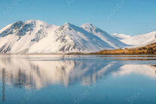 Hvalnes Nature Reserve and view of Mt. Eystrahorn . Beautiful mountain lake and black sand beach during winter Hofn , Southeastern Coast of Iceland  : 19 March 2020 photo