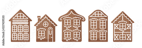 Set of gingerbread houses, European style. Appetizing traditional Christmas cookies, decorated with icing. Food illustration for stickers, posters, postcards, design elements