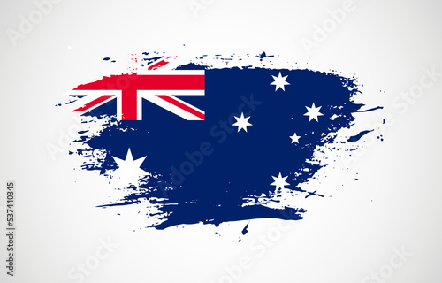 Grunge brush stroke with the national flag of Australia on a white isolated background