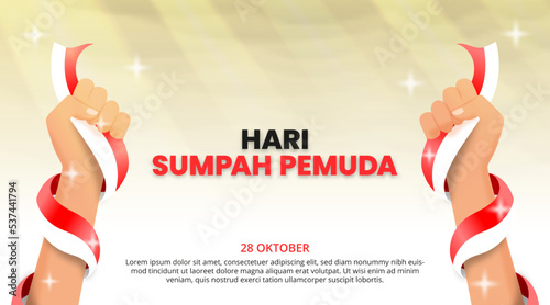 Hari sumpah pemuda or Indonesian youth pledge day with hands holding flags
