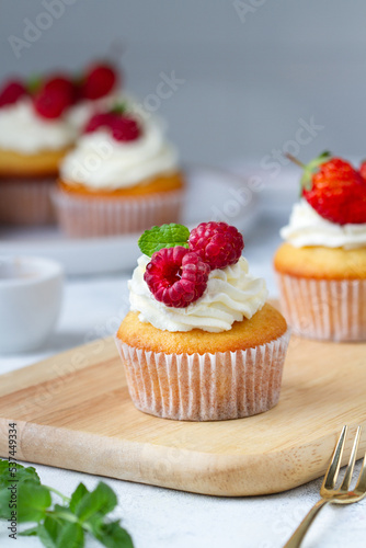 Cupcake with raspberries, close-up