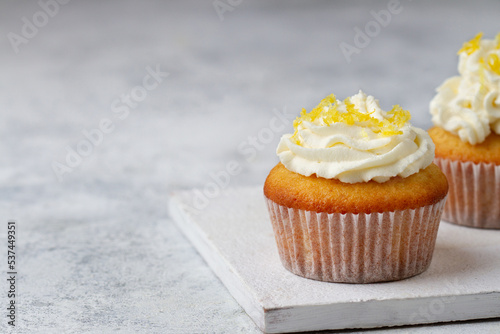 Cupcake with lemon close up, copy space