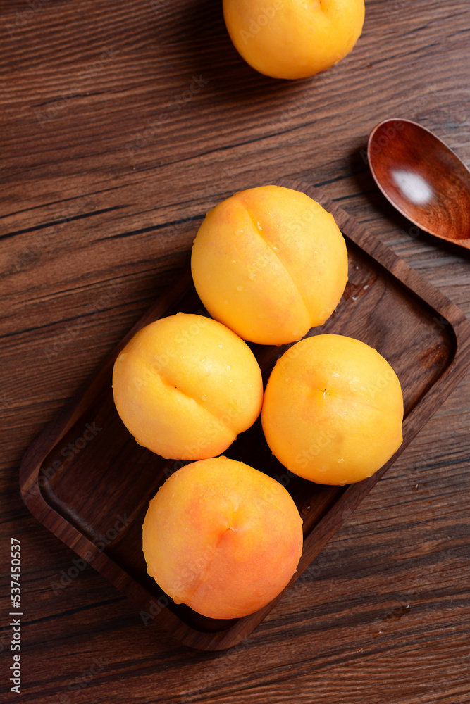 Yellow peach on a table Yellow peach on a table