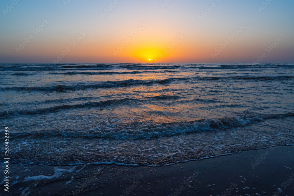 Bright dawn on the seashore